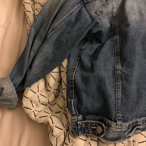 Lightly worn, distressed, denim jacket